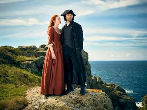 Captain Ross Poldark and Demelza stood on a Cornish cliff top