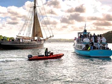 A ship, a ferry and a RIB on the River Fal.