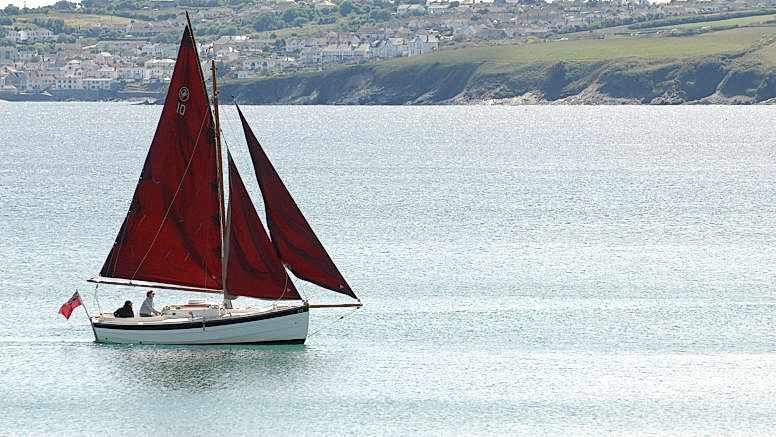 A sailing ship on the south Cornish sea.